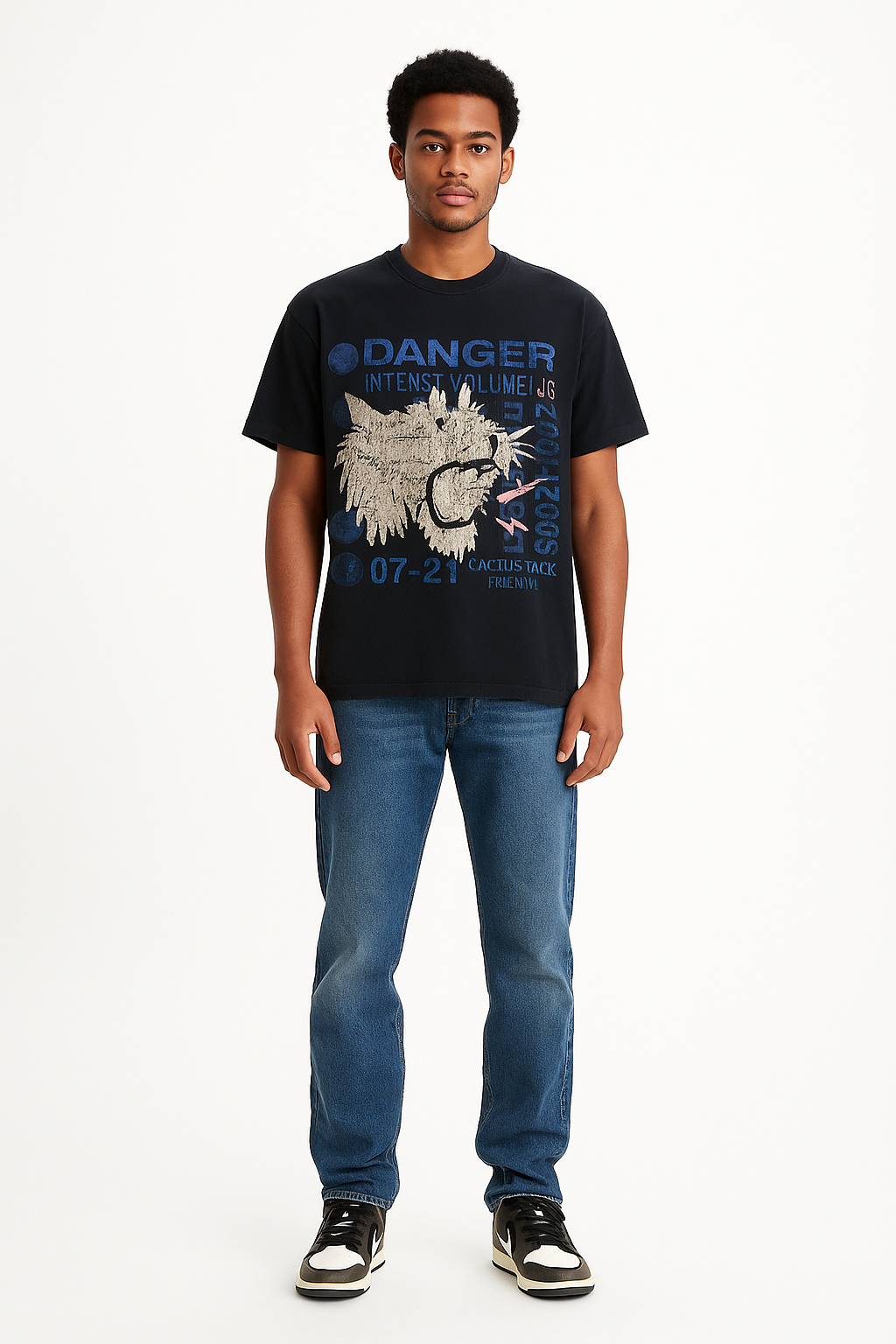 Person wearing a black t-shirt with graphic design and text, standing against a white background